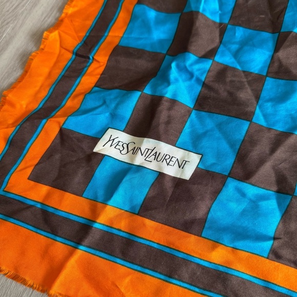 Yves Saint Laurent Silk Raw Hem
26” x 26”
Color Orange Blue Brown - Picture 3 of 4
